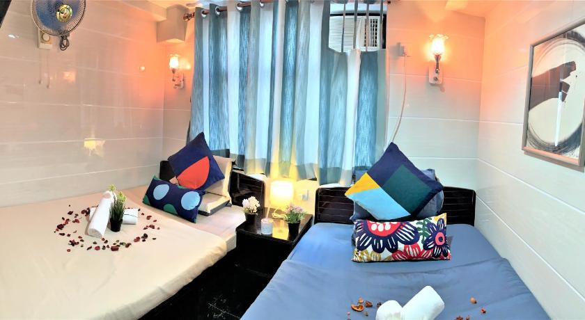 Image of Triple Room with 1 Double Bed and 1 Single Bed 0