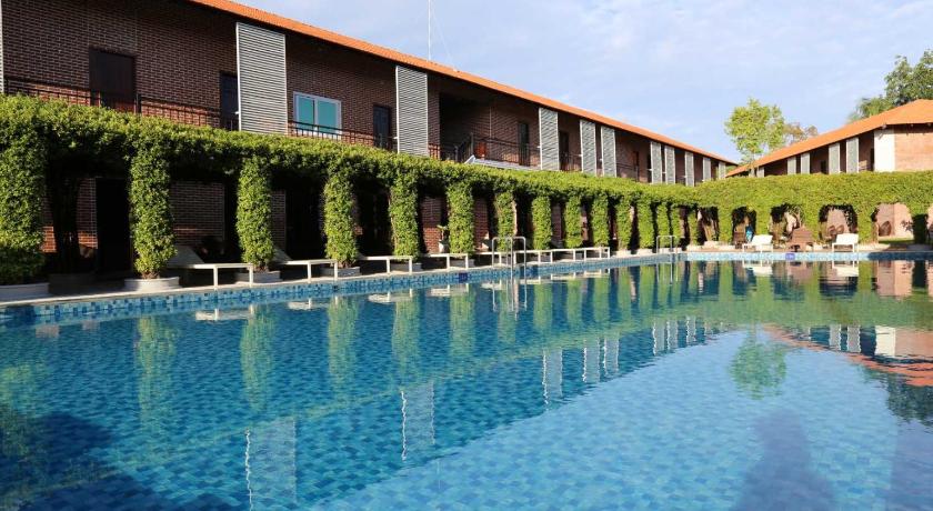 a large pool of water in front of a building, Countryside Phu Quoc Resort in Phu Quoc Island