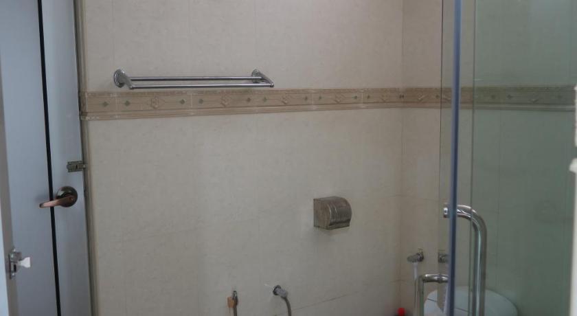 a bathroom with a toilet, sink, and shower, Loft 3 in Padang Besar