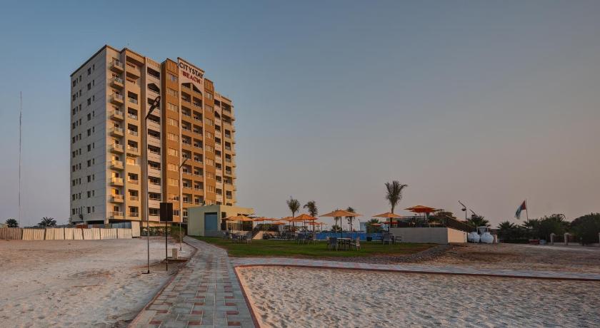 a very tall building with a lot of windows on the side of it, City Stay Beach Hotel Apartments in Ras Al Khaimah