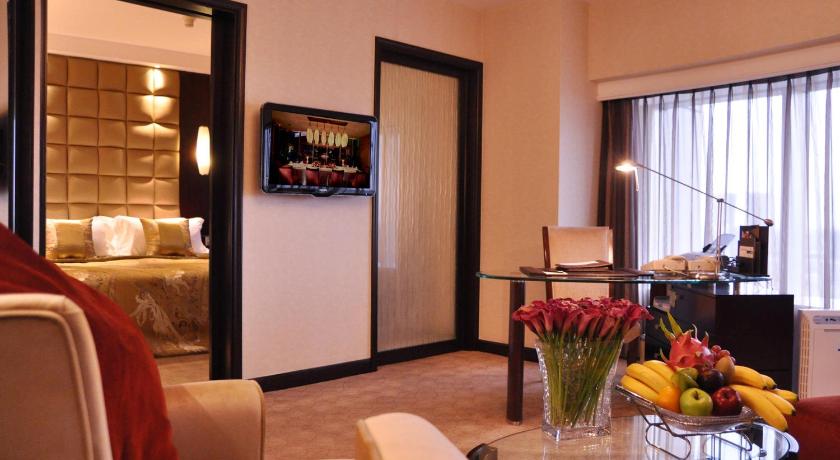 Фото: Представительский Люкс с кроватью размера king (Executive Suite King) 6