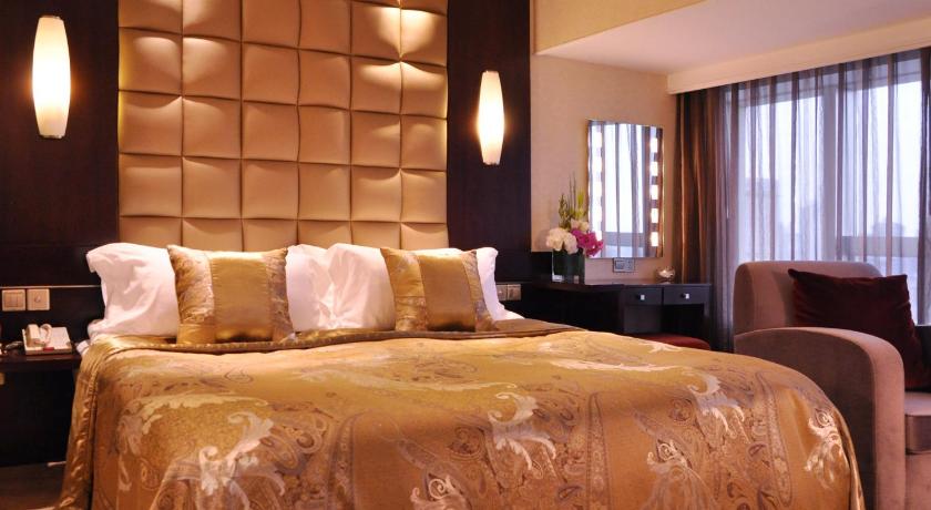 Фото: Представительский Люкс с кроватью размера king (Executive Suite King) 1