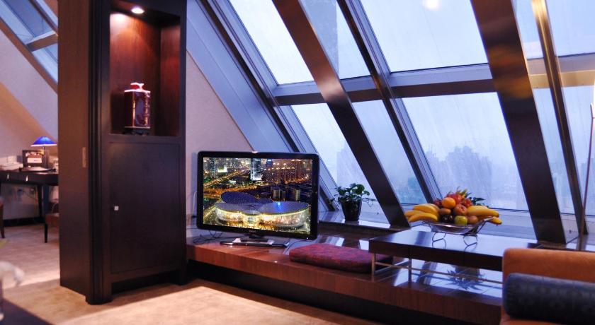 Фото: Представительский Люкс с кроватью размера king (Executive Suite King) 5