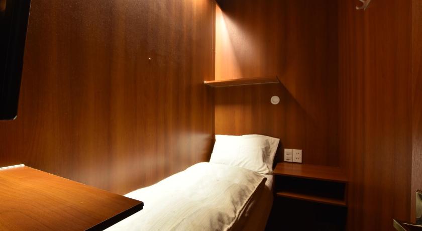 Image of Single Capsule with Shared Bathroom 0