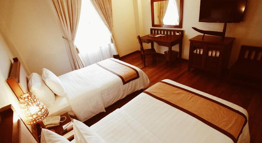 รูปของดีลักซ์ เตียงแฝด วิวสวน (Deluxe Twin Room Garden View) 7