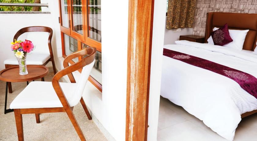 UNNATHI SUITES photo