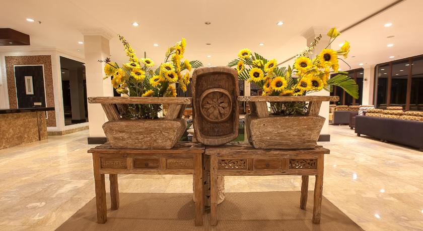 a vase filled with flowers on top of a table, The Beverly Hills Bali a Luxury Villas & Spa in Bali