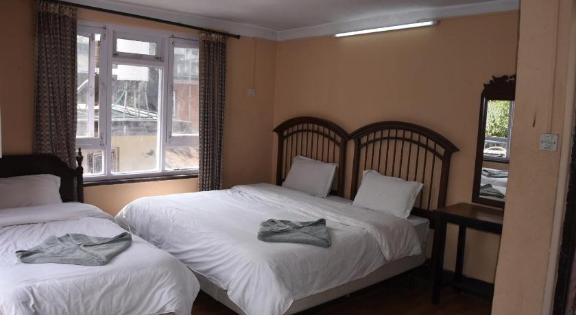Image of Triple Room with Private Bathroom 3