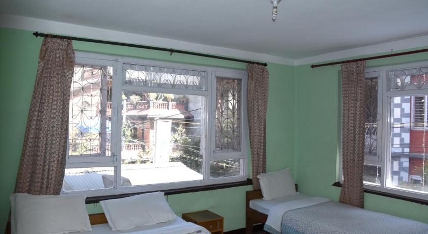 Image of Triple Room with Private Bathroom 2