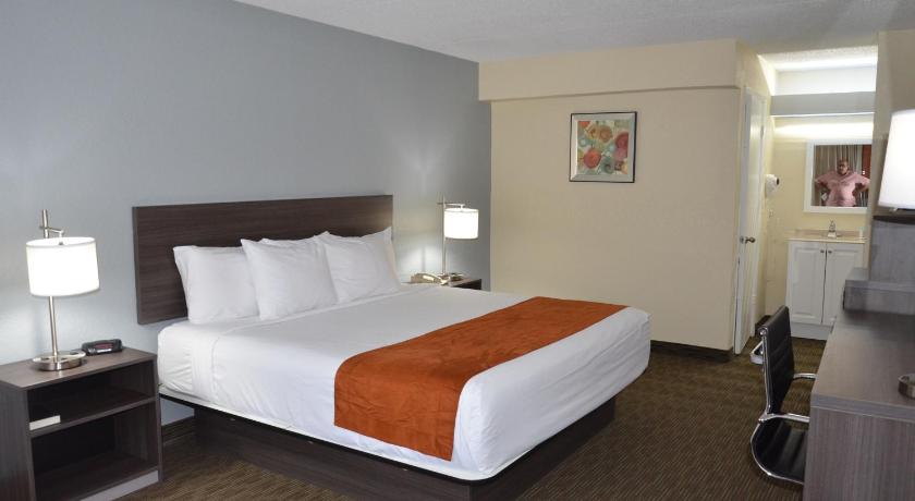 Days Inn & Suites by Wyndham Orlando Airport photo
