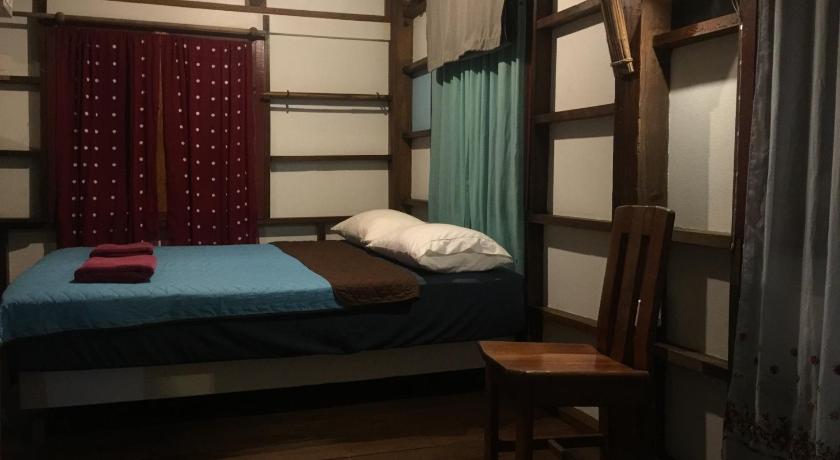 Image of Triple Room with Shared Bathroom 5