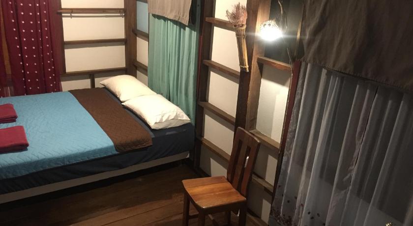 Image of Triple Room with Shared Bathroom 4
