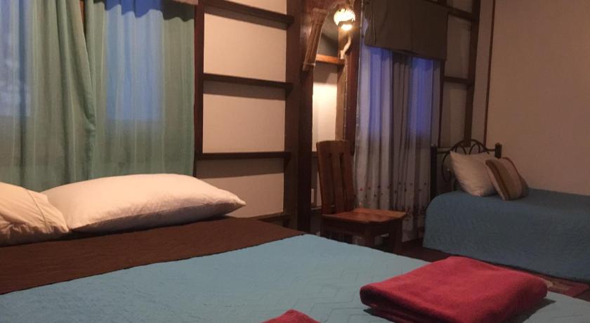 Image of Triple Room with Shared Bathroom 1
