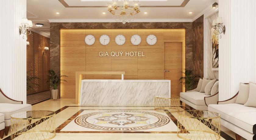 a living room filled with furniture and a large mirror, Gia Quy Hotel in Cao Bang