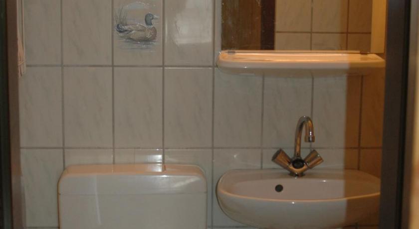 Image of Triple Room with Private Bathroom 12