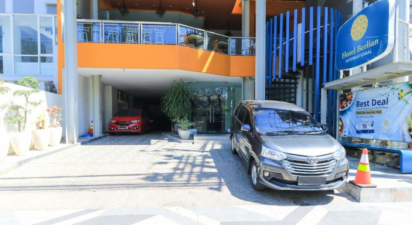 a car parked in front of a building, Hotel Berlian International Surabaya in Surabaya