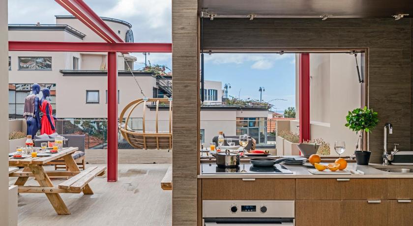 Drapes Design Apartments by An Island Apart photo