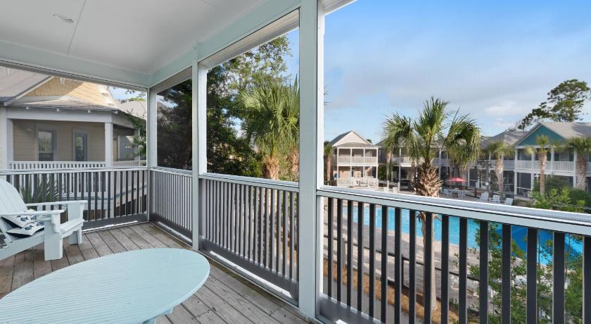 a patio view of a patio with a view of the ocean, Barefoot Cottages #B32 in Port Saint Joe