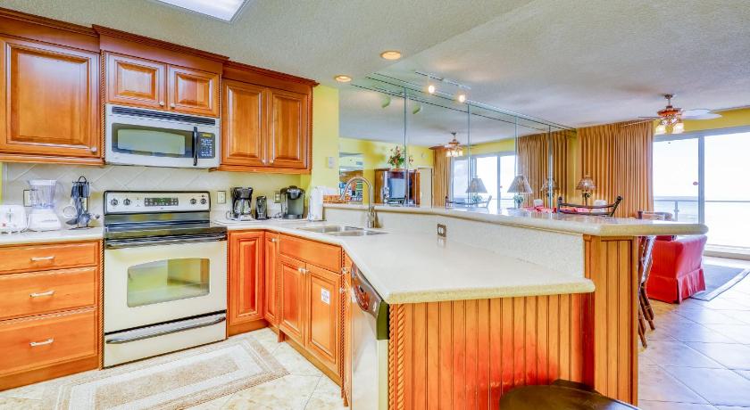 a kitchen with a sink, stove, microwave and refrigerator, Sterling Sands 505 Destin (Condo) in Destin (FL)