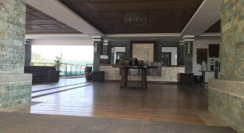 a large room with a table and chairs, Bristle Ridge Residences - Oakhill in Baguio