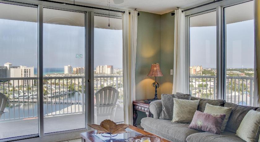 a living room filled with furniture and a window, The Terrace at Pelican Beach in Destin (FL)
