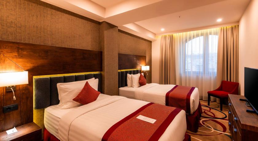 Image of 2-Bedroom Superior Suite, 1 King Bed, 2 Single Beds 6