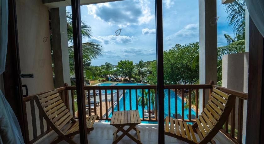 a patio view of a patio with a view of the ocean, Amaranthe Bay Resort & Spa in Trincomalee