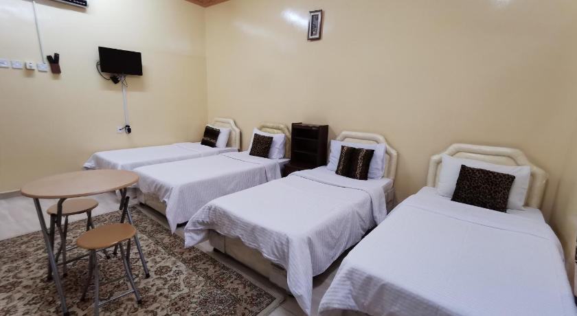 Image of Quadruple Room with Garden View 1