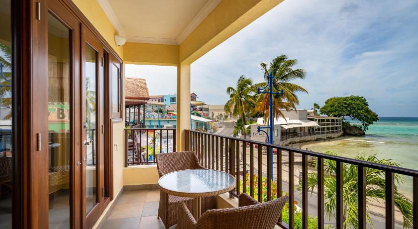 One Bedroom Top Floor Suite with Private Rooftop Patio and Seaview