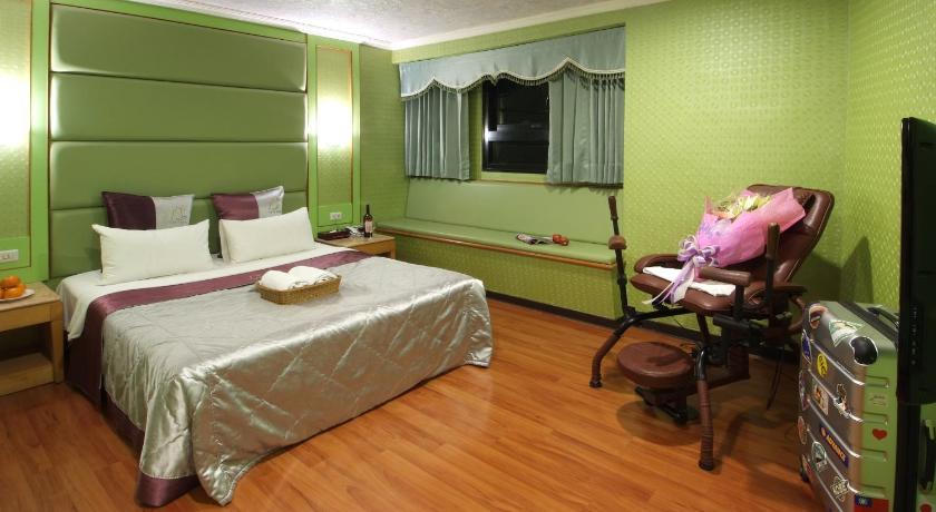 a bedroom with a bed and a desk, Left Bank Hotel in Hsinchu