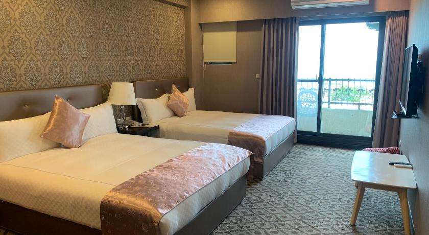 Image of Quadruple Room with Sea View 1