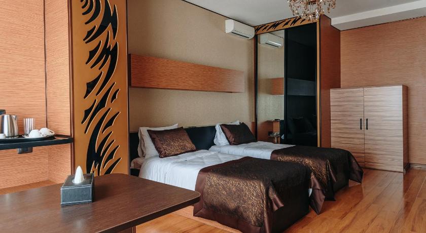 Tágas szoba 2 külön ággyal (Large Twin Room) fotója 0