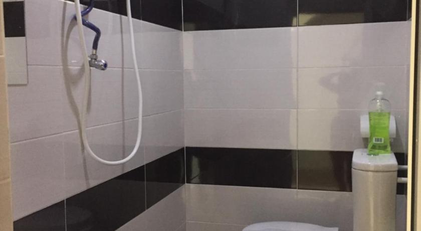 a bathroom with a sink, toilet and bathtub, COMFORTABLE STAY in Penang
