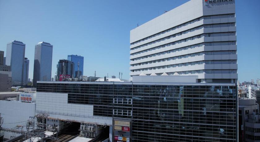 a large building with a lot of windows, Hotel Keihan Kyobashi GRANDE in Osaka