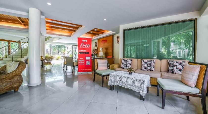 a room with a couch, chairs, and a table in it, Suan Palm Garden View in Rayong