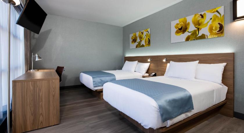 Zdjęcie: Pokój z 2 łóżkami podwójnymi – dla niepalących (2 Double Beds, Non-Smoking) 1
