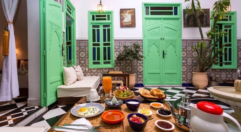a kitchen filled with lots of different types of food, Riad Rose Meryam in Marrakech