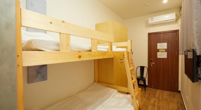 a bunk bed in a small room, Meego Youth Hotel in Shanghai