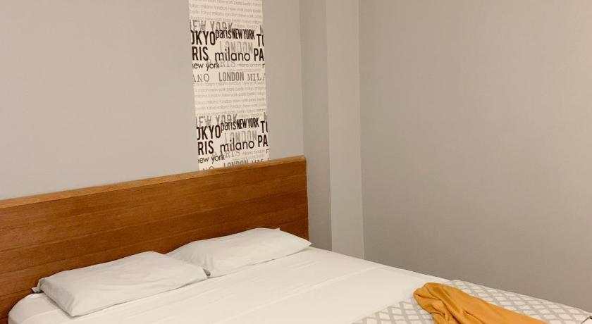 Image of Triple Room with Private Bathroom 12