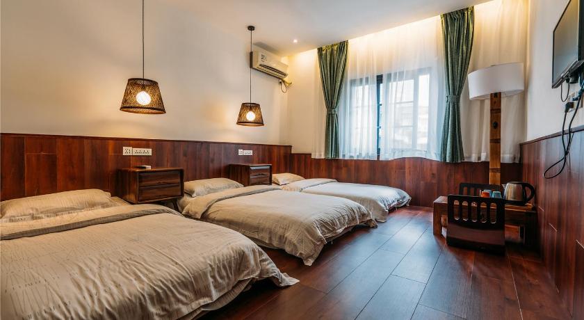 Image of Triple Deluxe Room with Private Bathroom 3