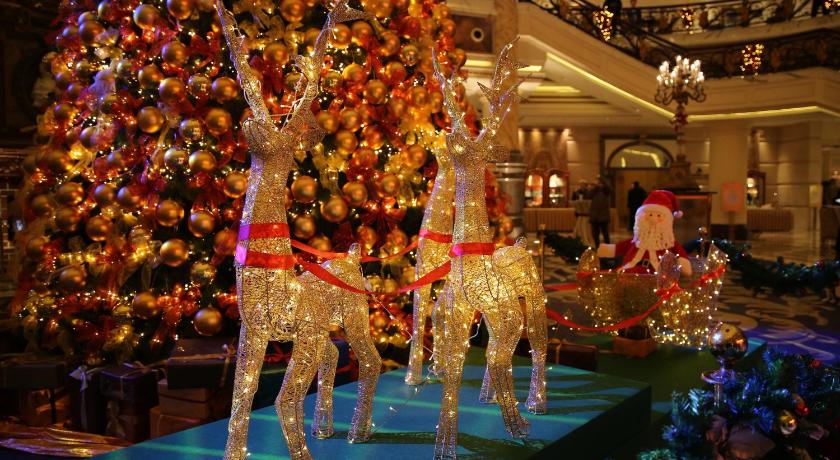 a large group of people standing on top of a christmas tree, Legendale Hotel Wangfujing Beijing in Beijing