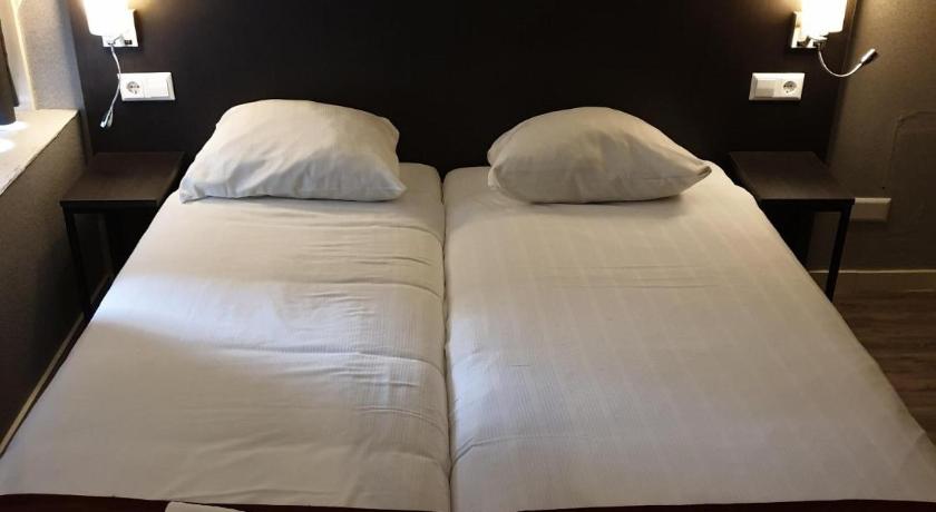 Gazdaságos szoba 2 külön ággyal ablak nélkül (Economy Twin Room without Window) fotója 1