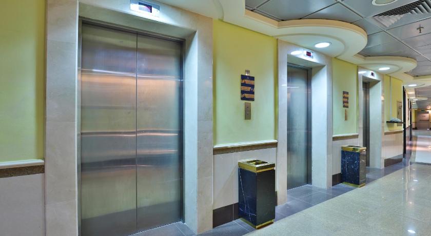 a public restroom with a walk in shower, Nawazi Watheer Hotel in Mecca