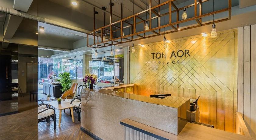 a large kitchen with a large counter top, Ton Aor Place Hotel Ratchada in Bangkok