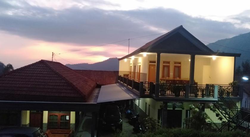 a large building with a view of the ocean, Homestay Anggun Bromo in Bromo