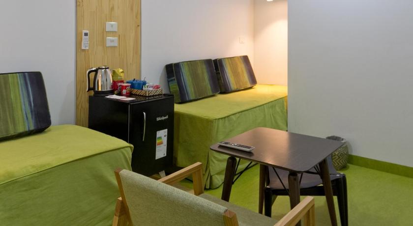 Image of Quadruple Room with Garden View 8