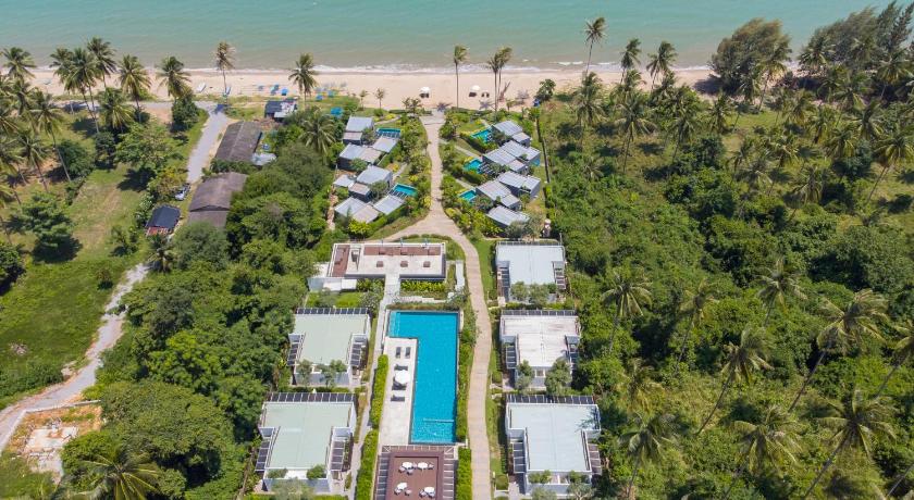 a city with a lot of palm trees and palm trees, SEAnery Beach Resort in Prachuap Khiri Khan