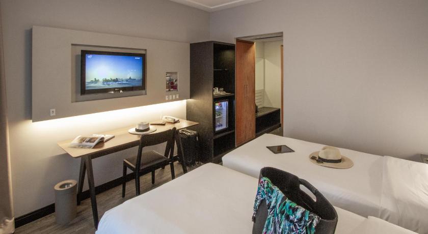 Image of Executive apartment with two single beds upper floor modern design 5