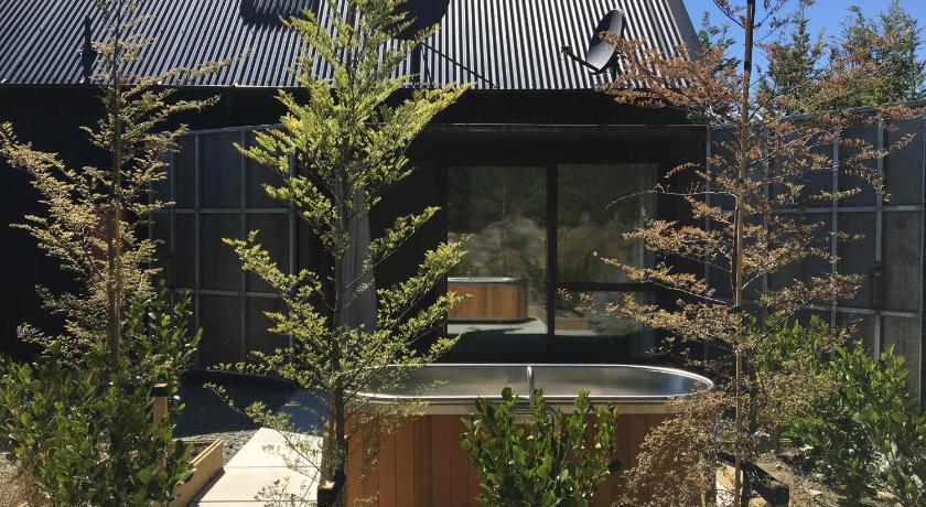 The Black House with Stunning Outdoor Bath photo