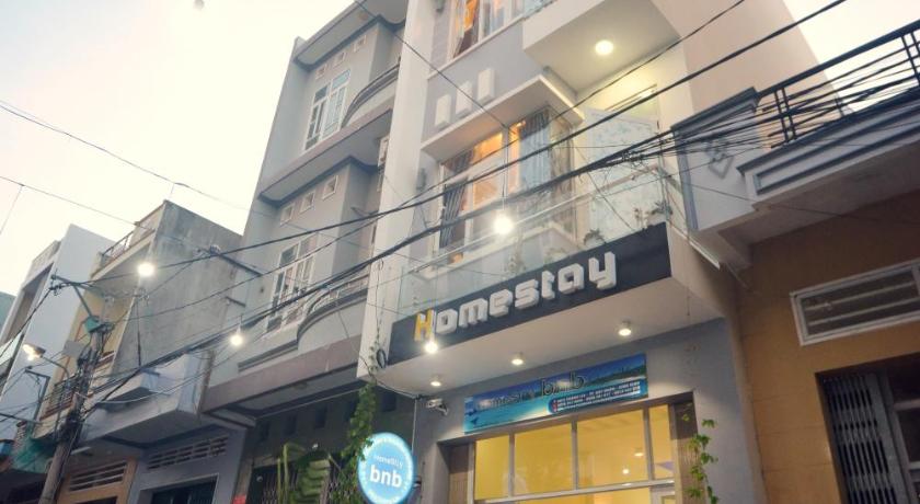a large building with a clock on the front of it, Quynhonhomestaybnb in Quy Nhon (Binh Dinh)